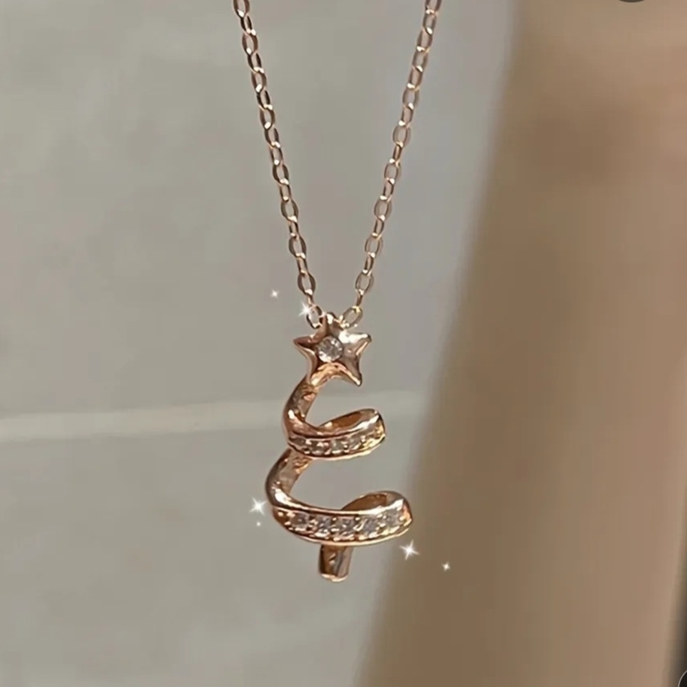 Gold Spiral Pendant Necklace with Sparkling Stones